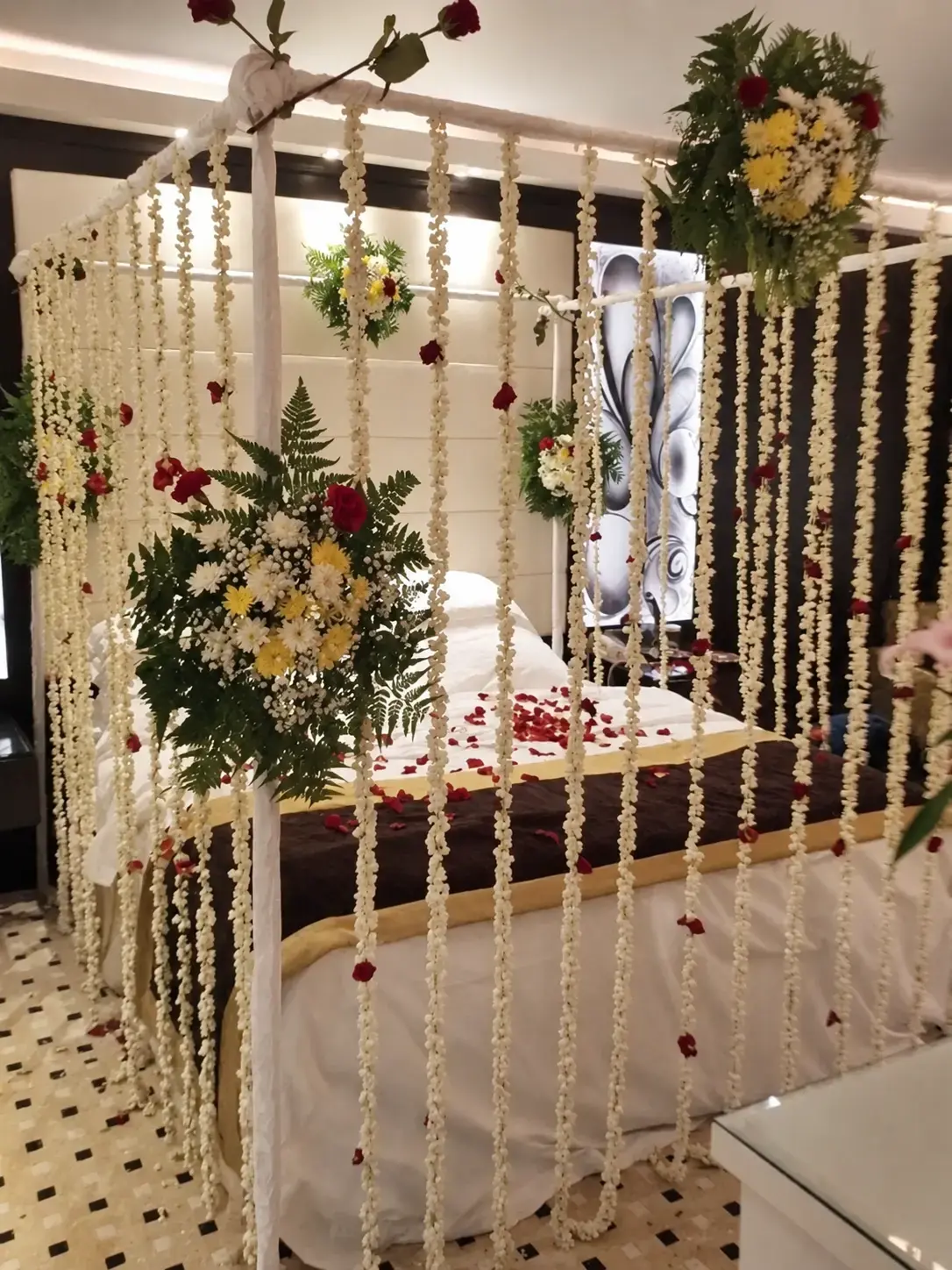 Bed decorated with flowers for a wedding celebration